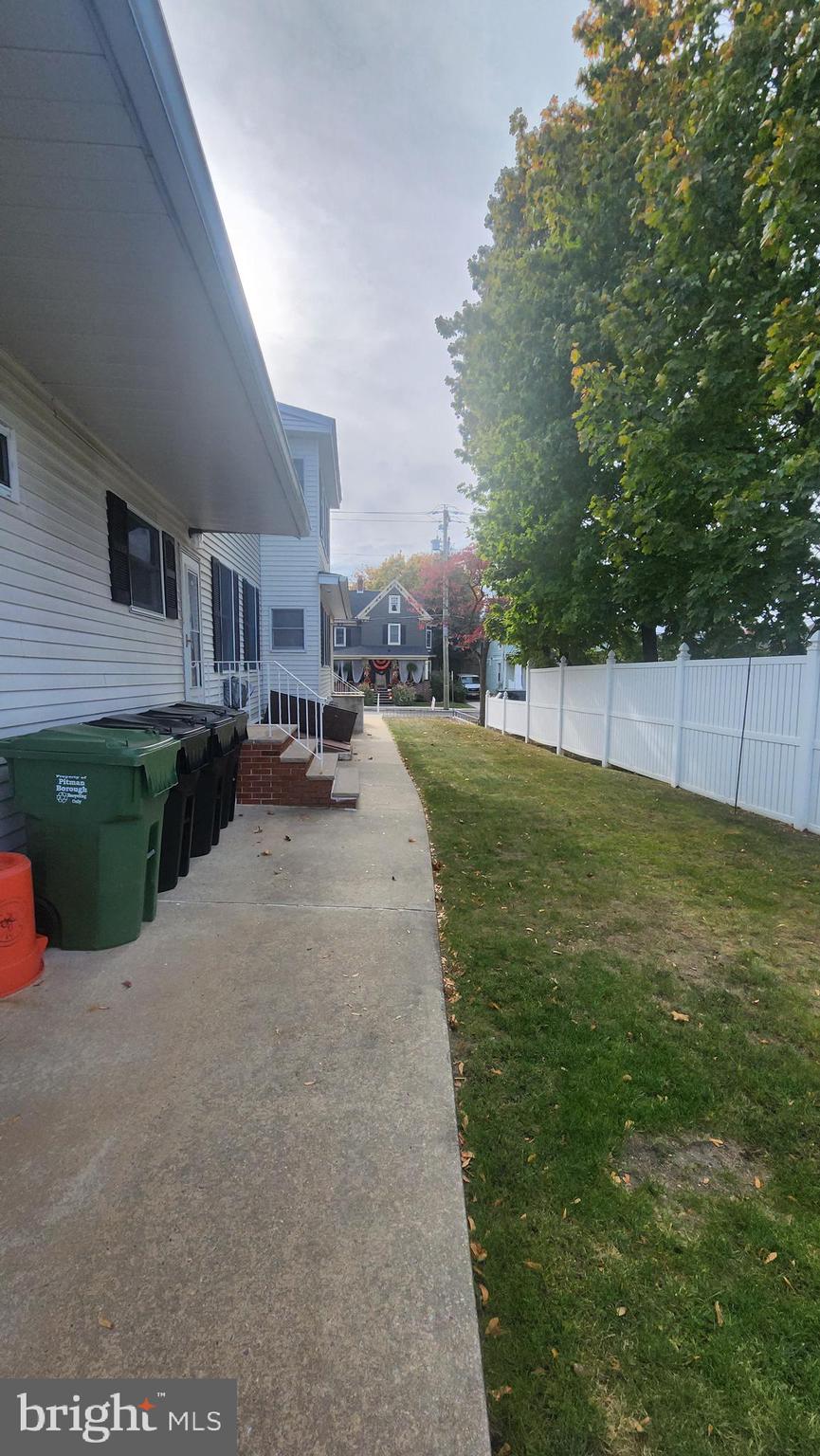 60 Pitman Avenue, Unit 60 Pitman, NJ 08071 - Photo 10 of 12 a view of a backyard of the house