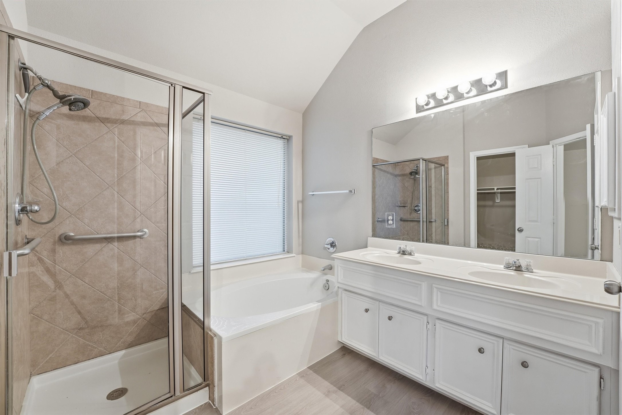 20931 Hamlet Ridge Lane Katy, TX 77449 - Photo 17 of 23 En-suite bath with dual features including soaking tub and separate shower.