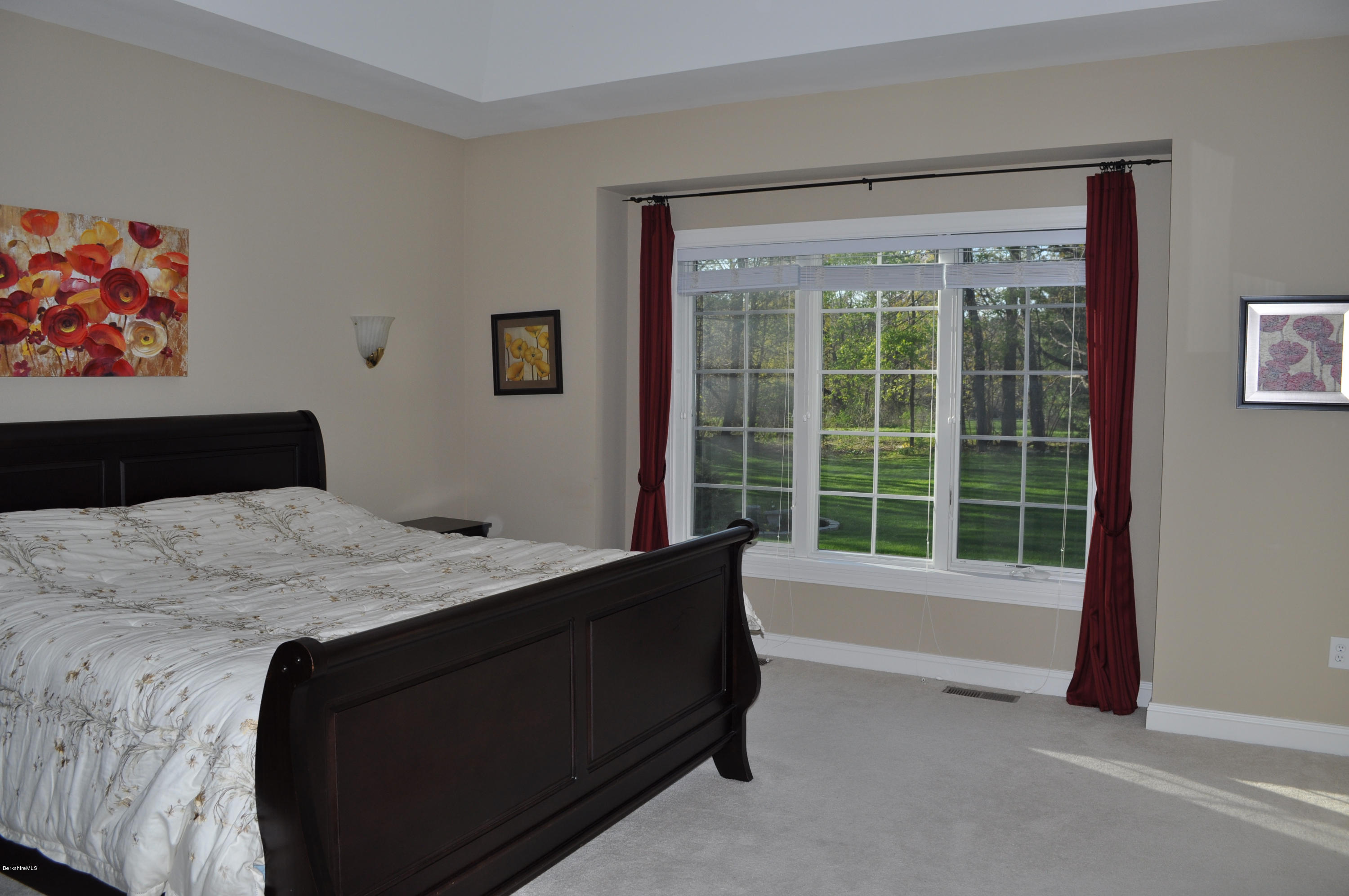 50 Stockbridge Road Lee, MA 01238 - Photo 15 of 27 a bedroom with a bed and a window