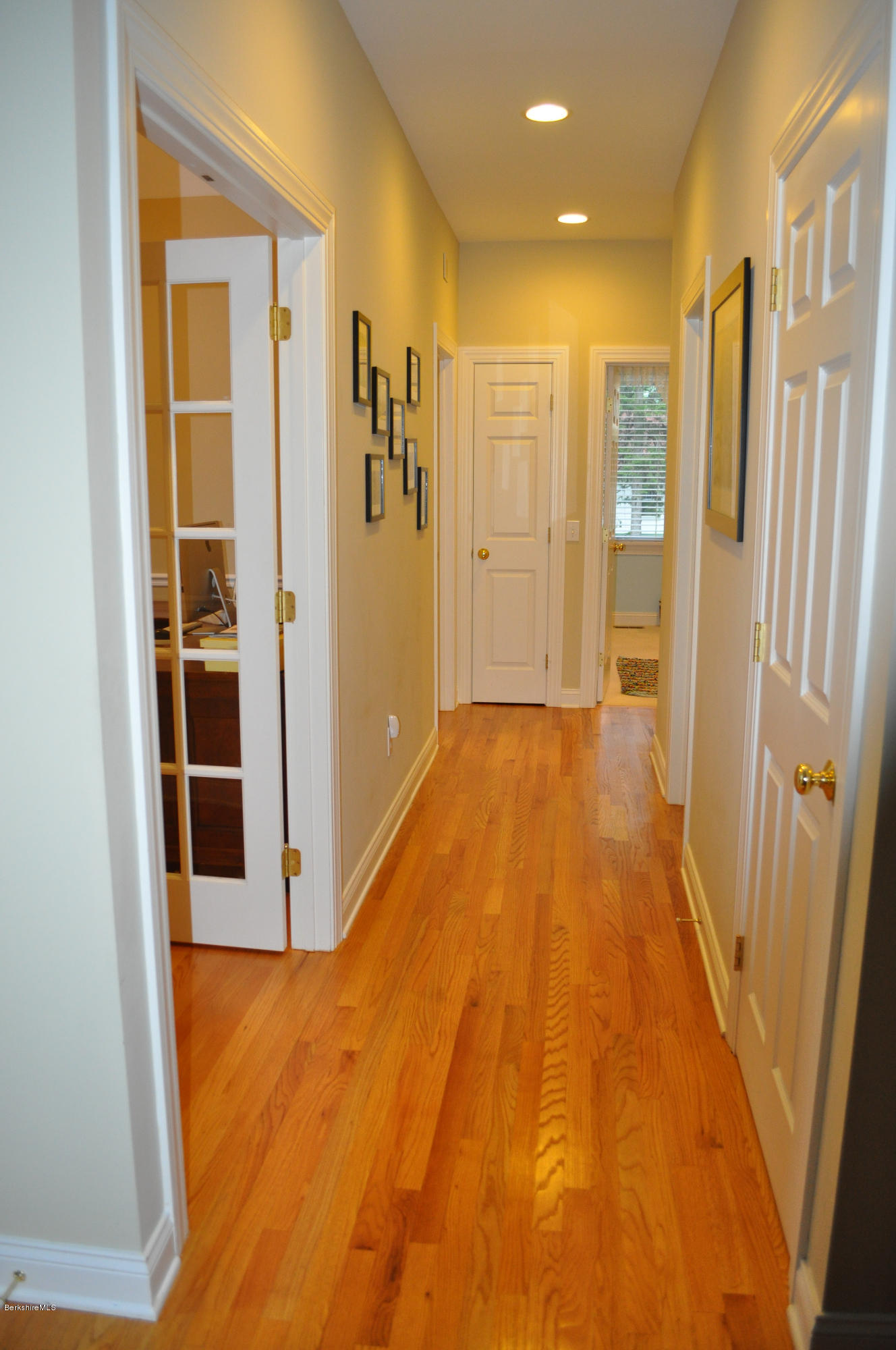 50 Stockbridge Road Lee, MA 01238 - Photo 23 of 27 a view of a hallway with wooden floor and closet
