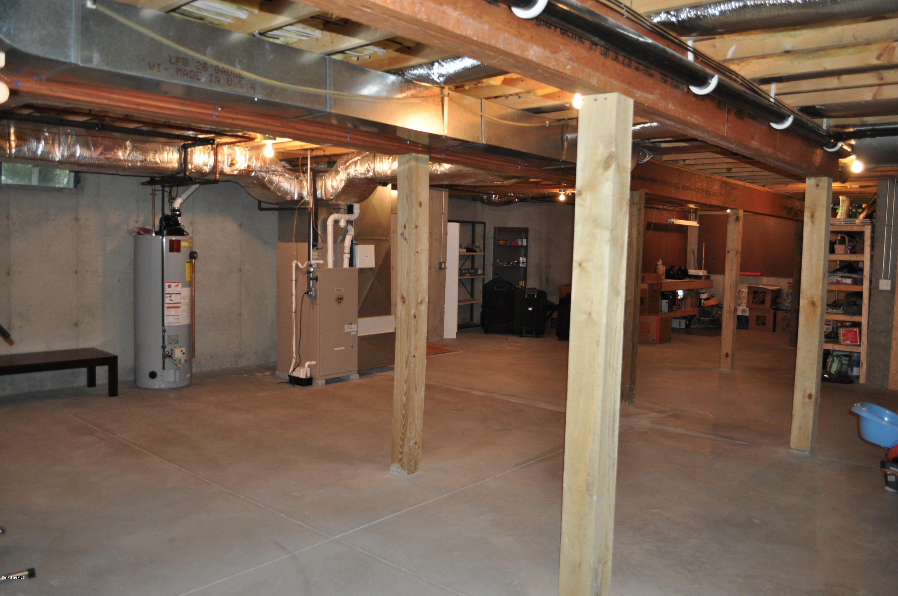 50 Stockbridge Road Lee, MA 01238 - Photo 27 of 27 a view of an empty room with wooden floor