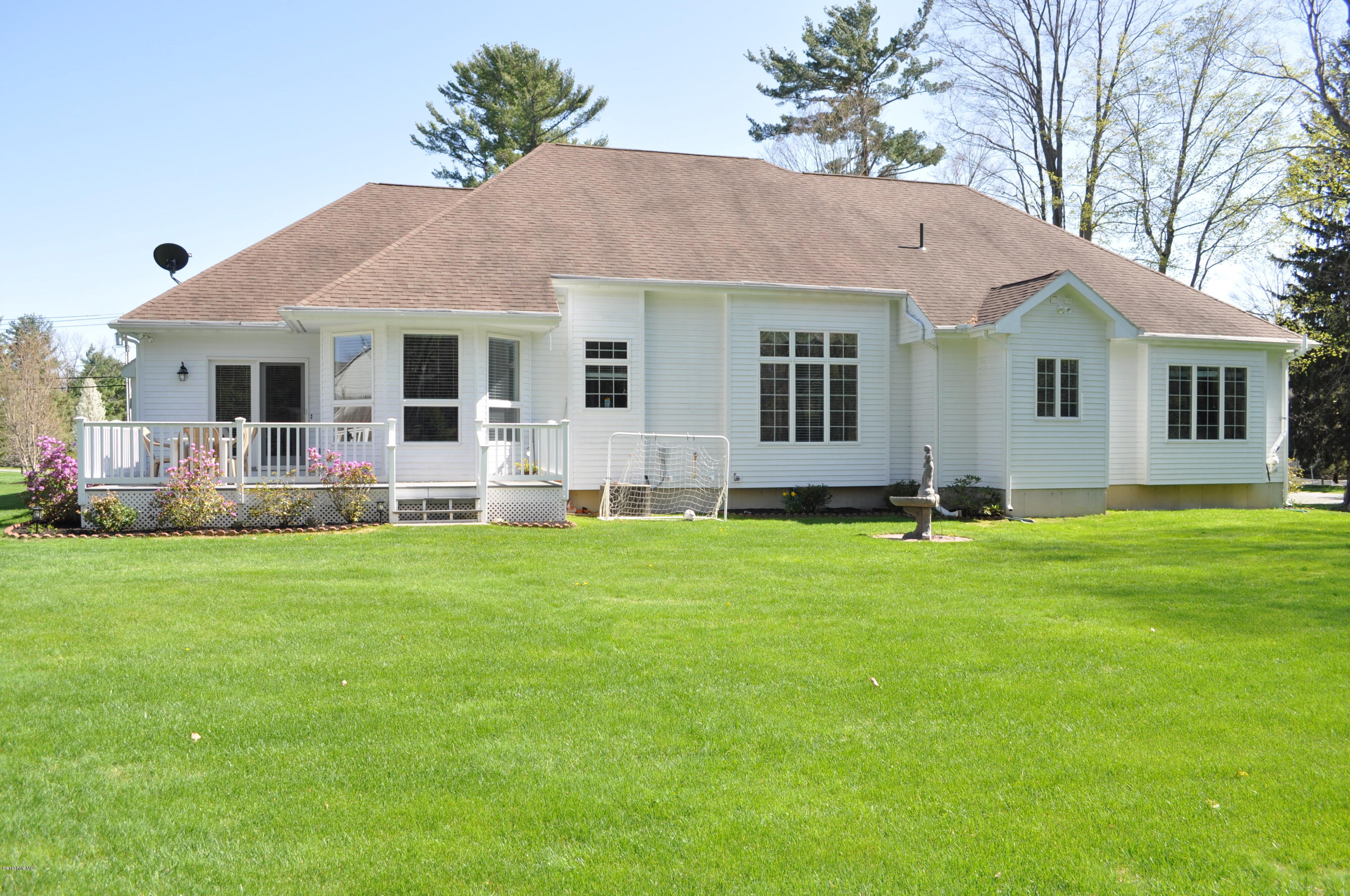 50 Stockbridge Road Lee, MA 01238 - Photo 5 of 27 a front view of house with yard and green space