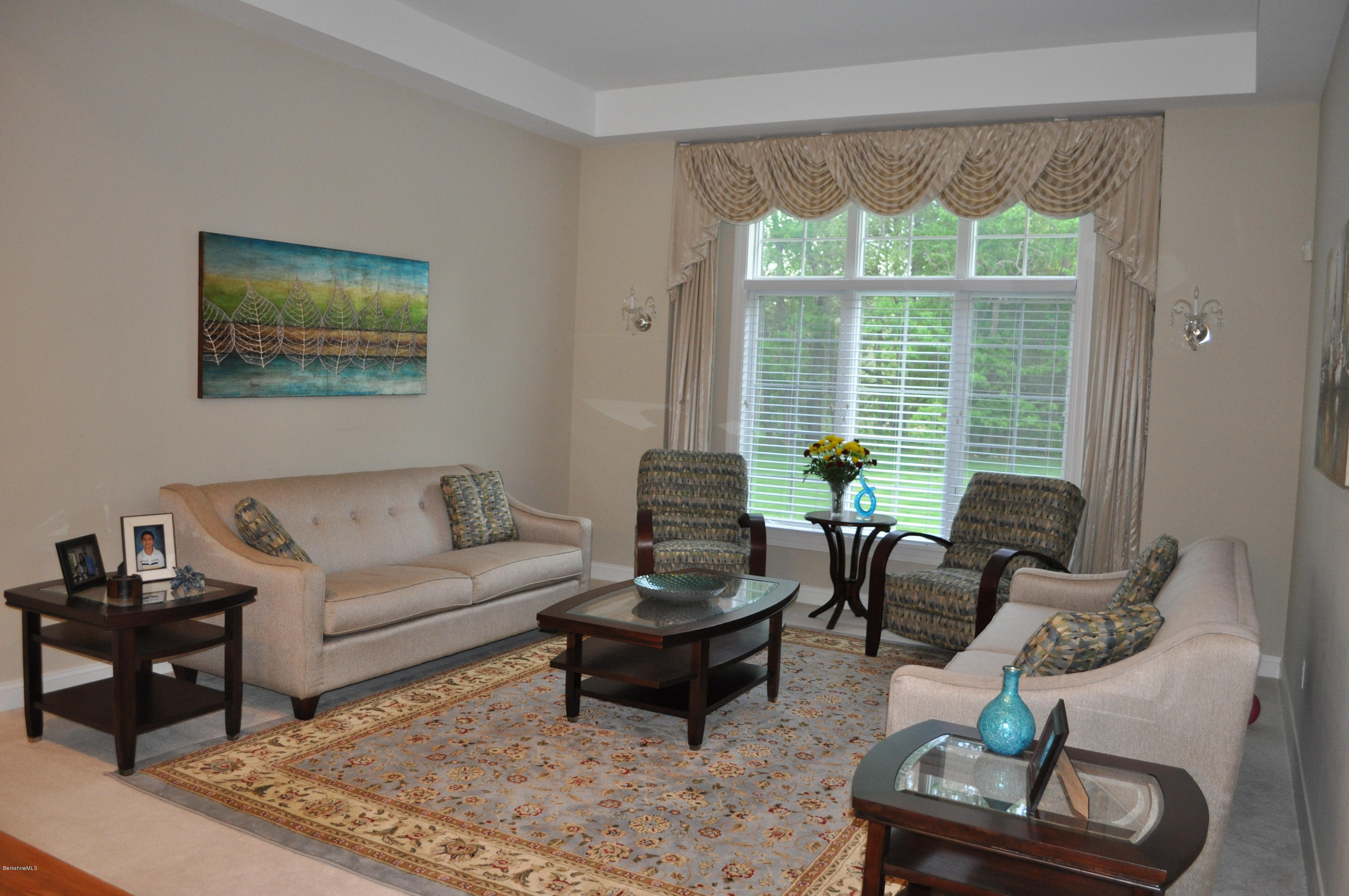50 Stockbridge Road Lee, MA 01238 - Photo 8 of 27 a living room with furniture and a large window