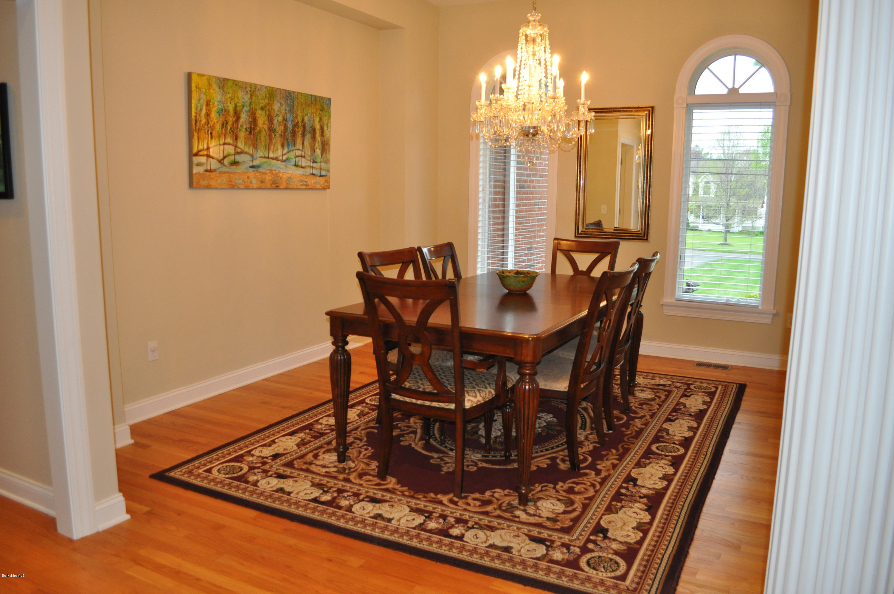 50 Stockbridge Road Lee, MA 01238 - Photo 9 of 27 a view of a dining room with furniture window and wooden floor