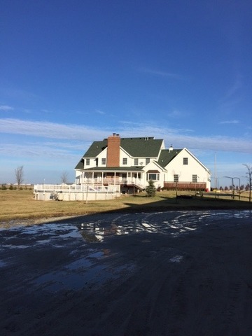 12663 West Offner Road Manhattan, IL 60442 - Photo 3 of 25 a view of a swimming pool with an ocean view