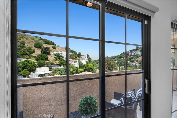 a view of a glass door with a from balcony