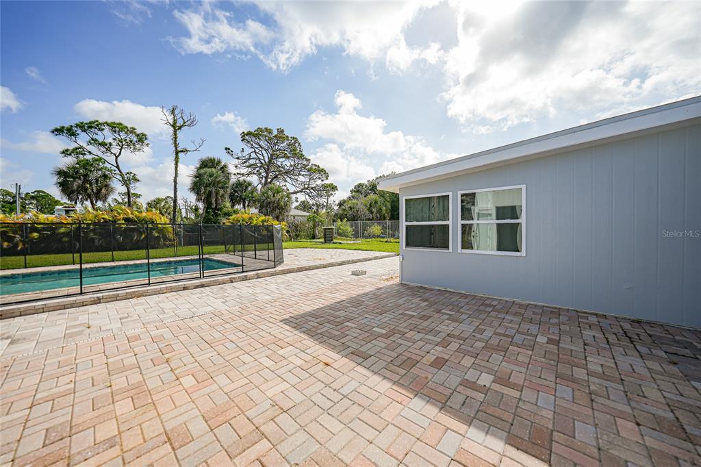 8164 Archie Street Englewood, FL 34224 - Photo 29 of 42 a view of a house with basketball court
