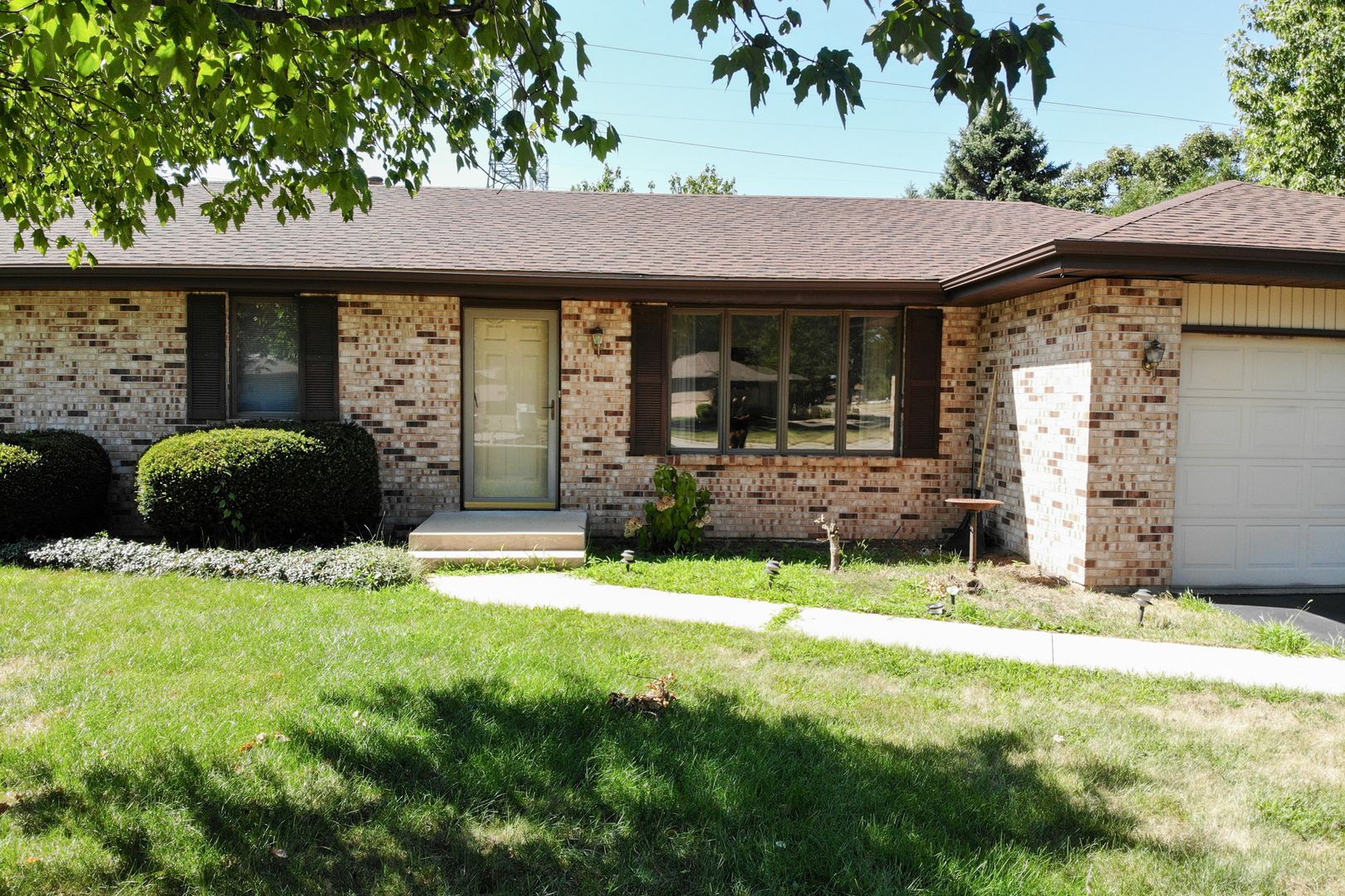 3801 Cutty Sark Road Cherry Valley, IL 61016 - Photo 2 of 25 a view of a house with backyard and porch