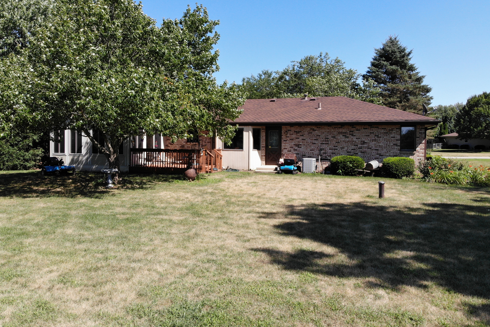 3801 Cutty Sark Road Cherry Valley, IL 61016 - Photo 23 of 25 a view of a house with a yard