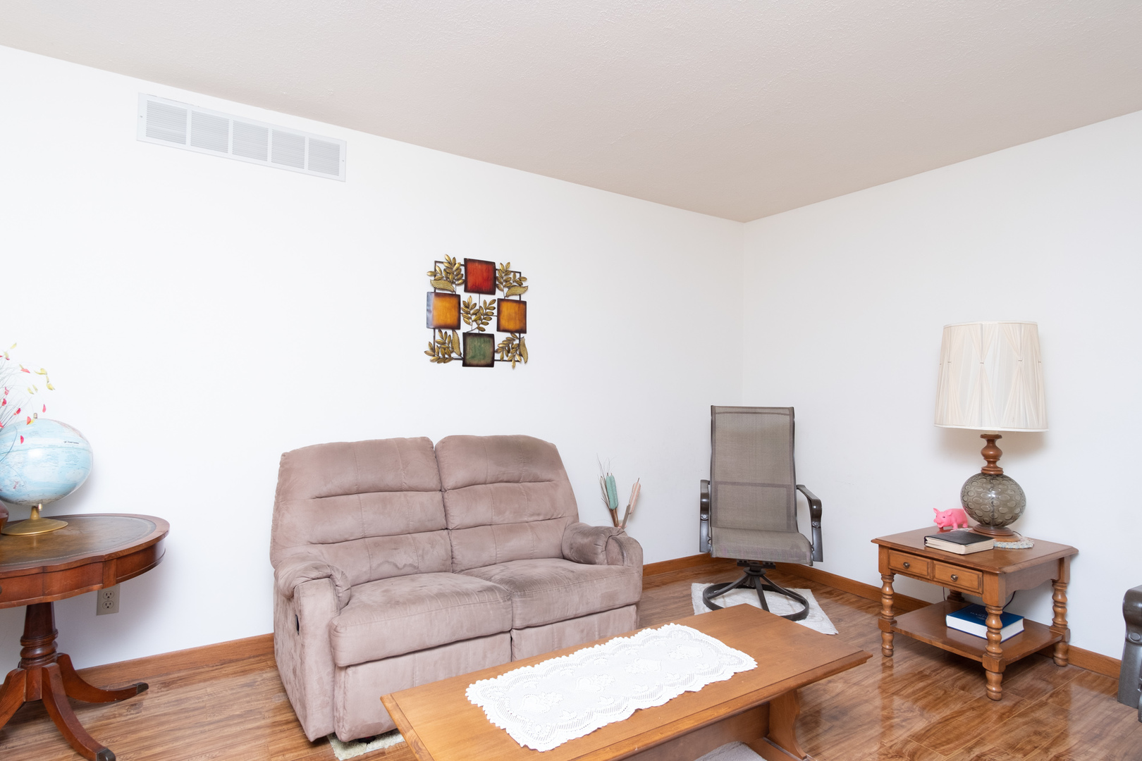 3801 Cutty Sark Road Cherry Valley, IL 61016 - Photo 5 of 25 a living room with furniture and a wooden floor