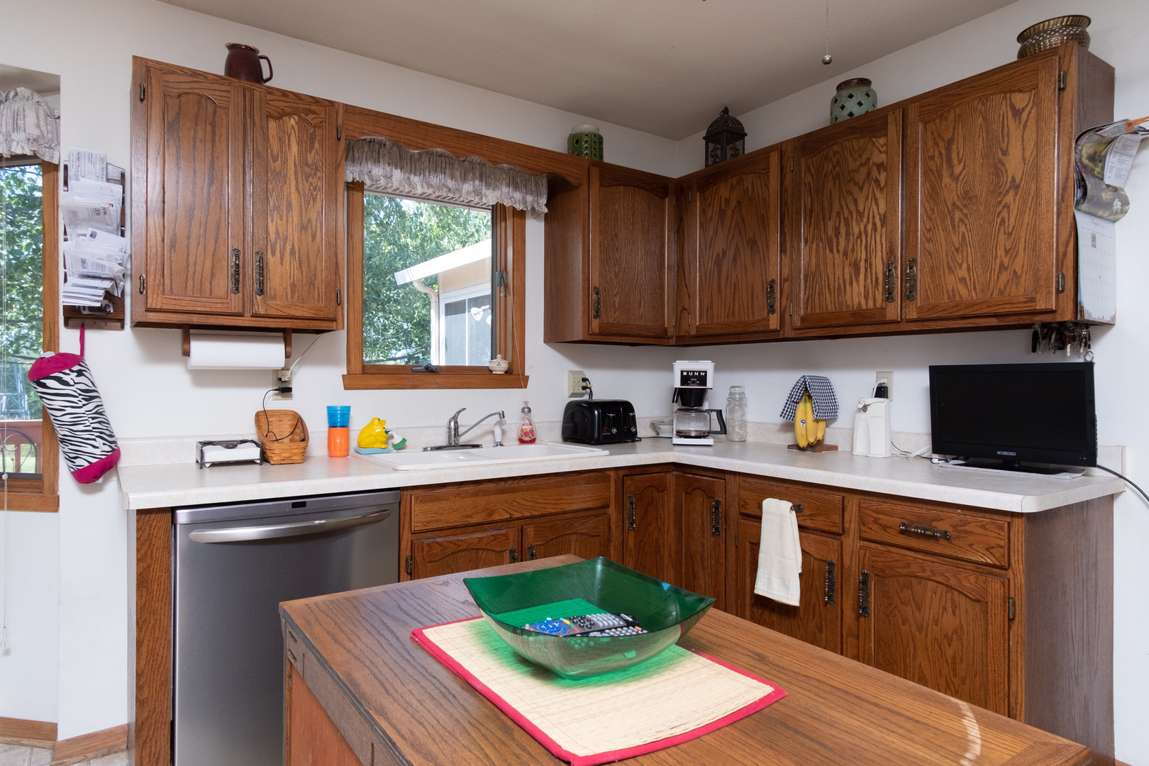 3801 Cutty Sark Road Cherry Valley, IL 61016 - Photo 6 of 25 a kitchen with a sink cabinets and window