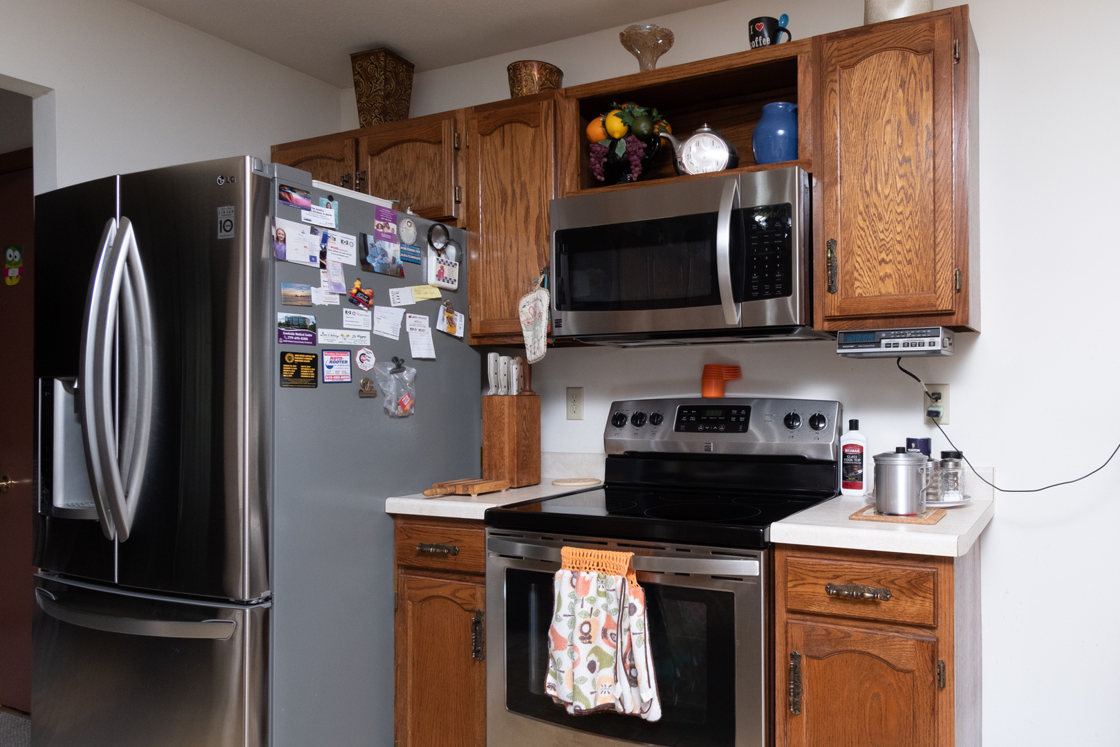 3801 Cutty Sark Road Cherry Valley, IL 61016 - Photo 7 of 25 a kitchen with stainless steel appliances granite countertop a refrigerator and a stove top oven