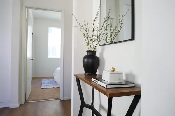 a room with a table and chairs
