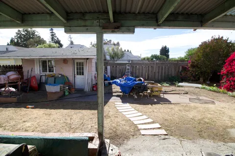a view of swimming pool with a patio