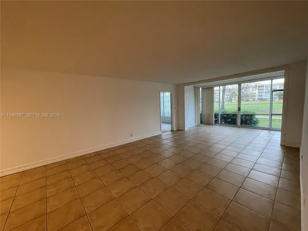 en empty room with windows