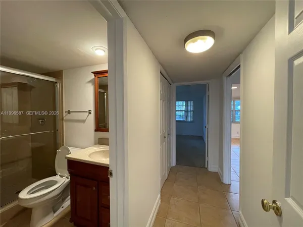 a bathroom with a toilet and a sink