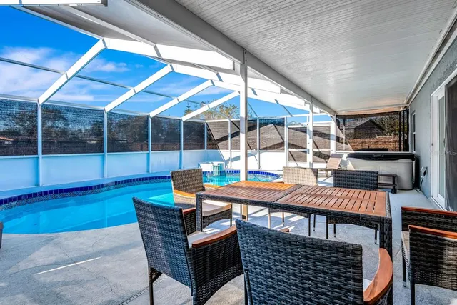 a outdoor space with patio furniture and potted plants