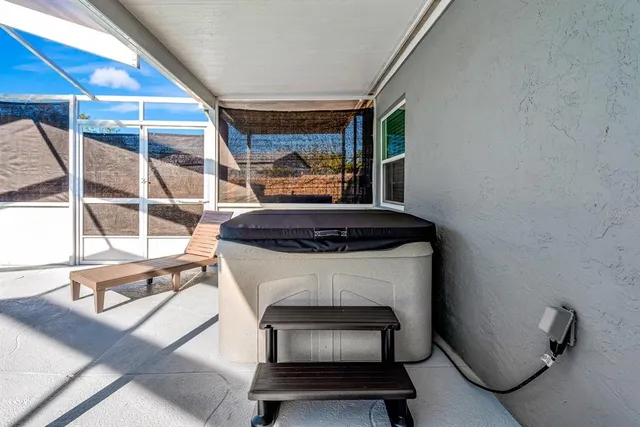 a living room with a fireplace and a table