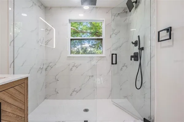 a bathroom with a bath tub