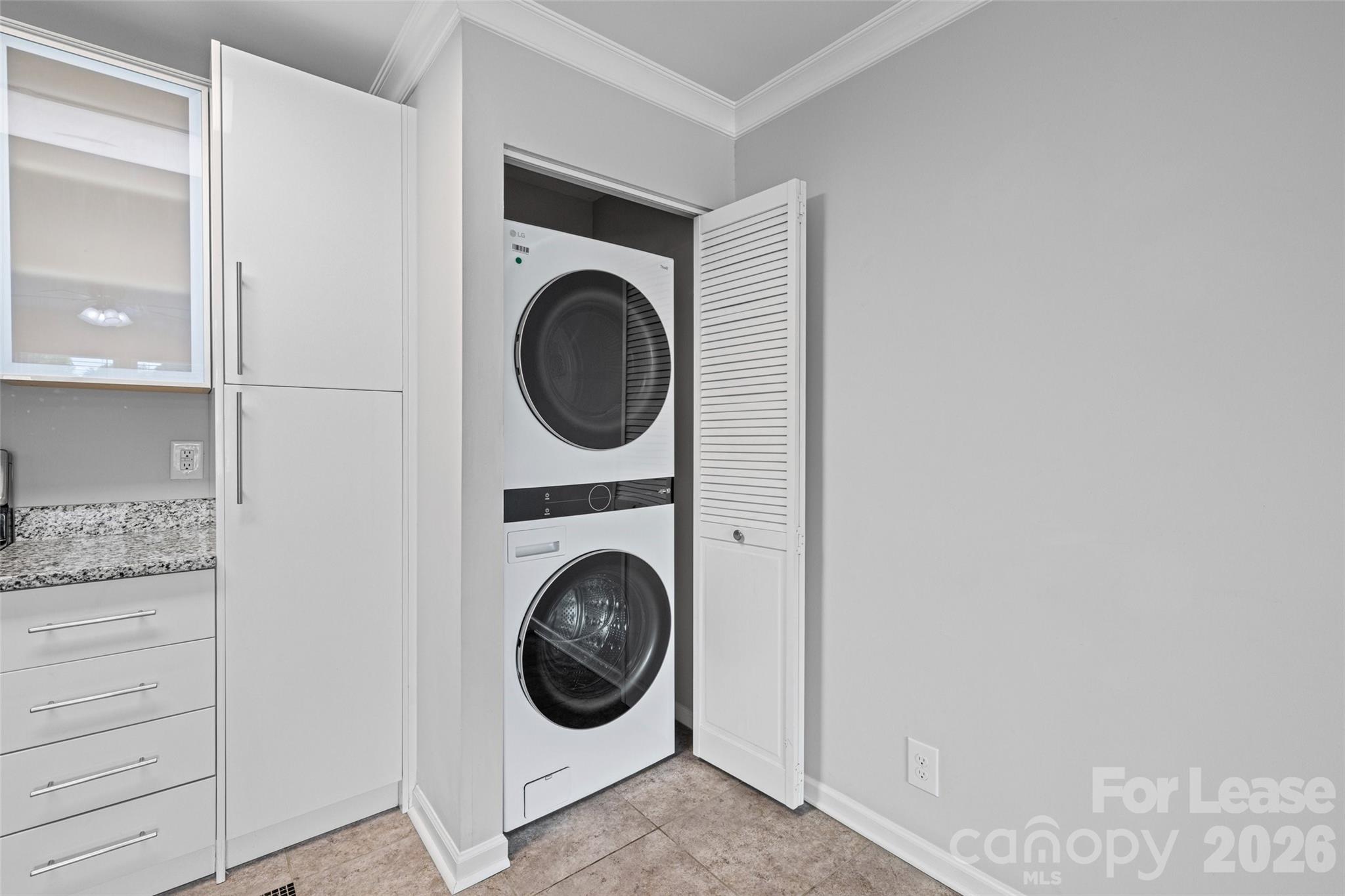 113 Stroupe Road, Unit E Gastonia, NC 28056 - Photo 15 of 33 a utility room with dryer and washer
