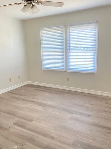 a view of a room that has a window in it