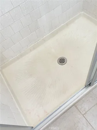 a view of a room that has a window in it