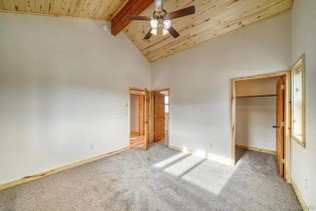a view of a hallway with a chandelier