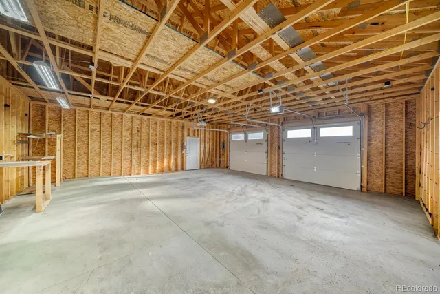 a view of a room with wooden walls