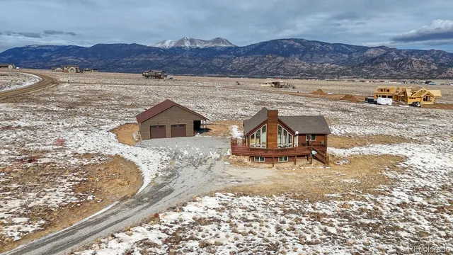 a view of a backyard of a house