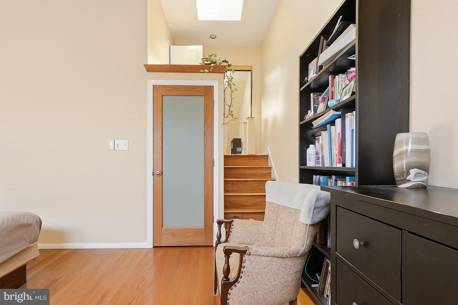 514 Randolph Court, Unit C Philadelphia, PA 19147 - Photo 7 of 10 a view of a workspace with furniture and wooden floor