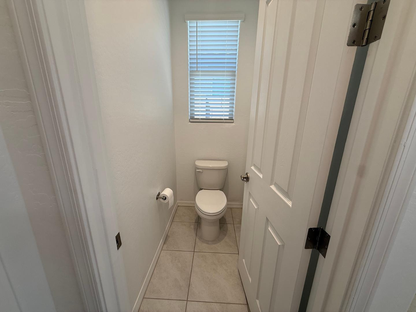 15744 West Jefferson Street Goodyear, AZ 85338 - Photo 20 of 26 a bathroom with a toilet and a shower