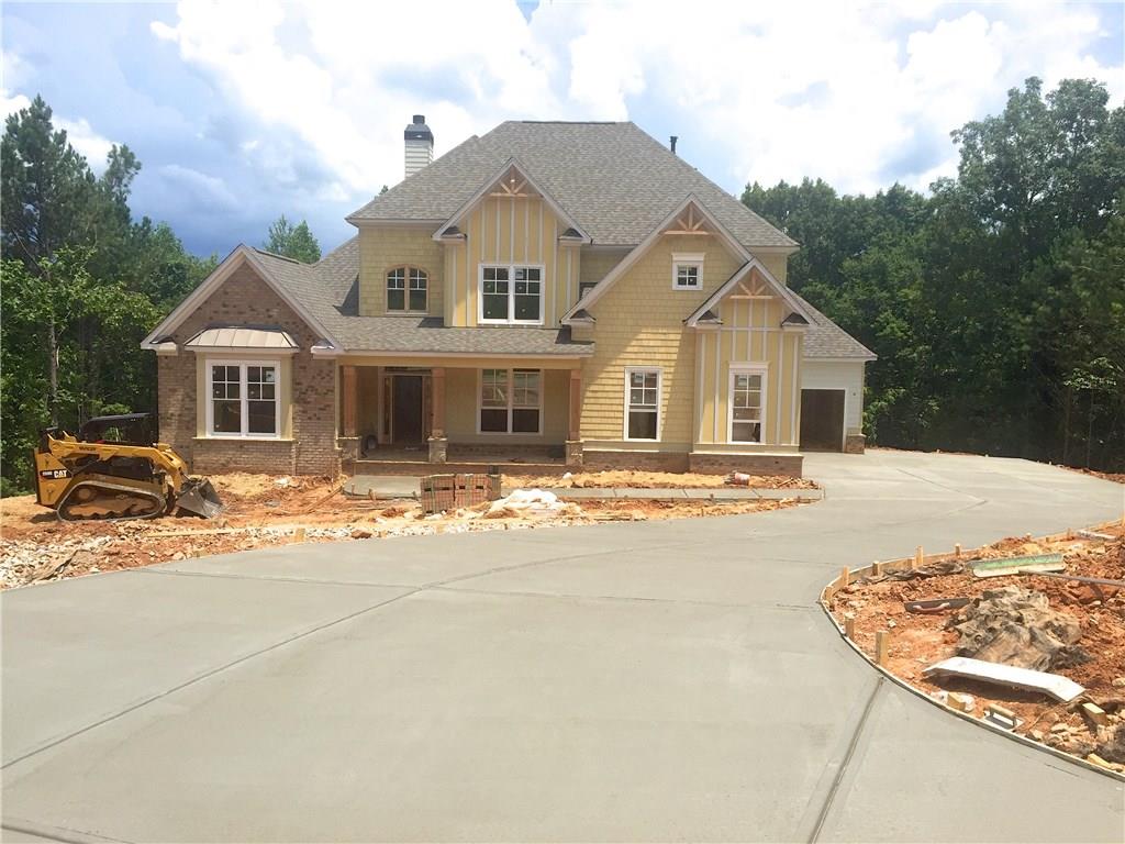 207 Maggies Road Canton, GA 30115 - Photo 1 of 1 a front view of a house with a yard