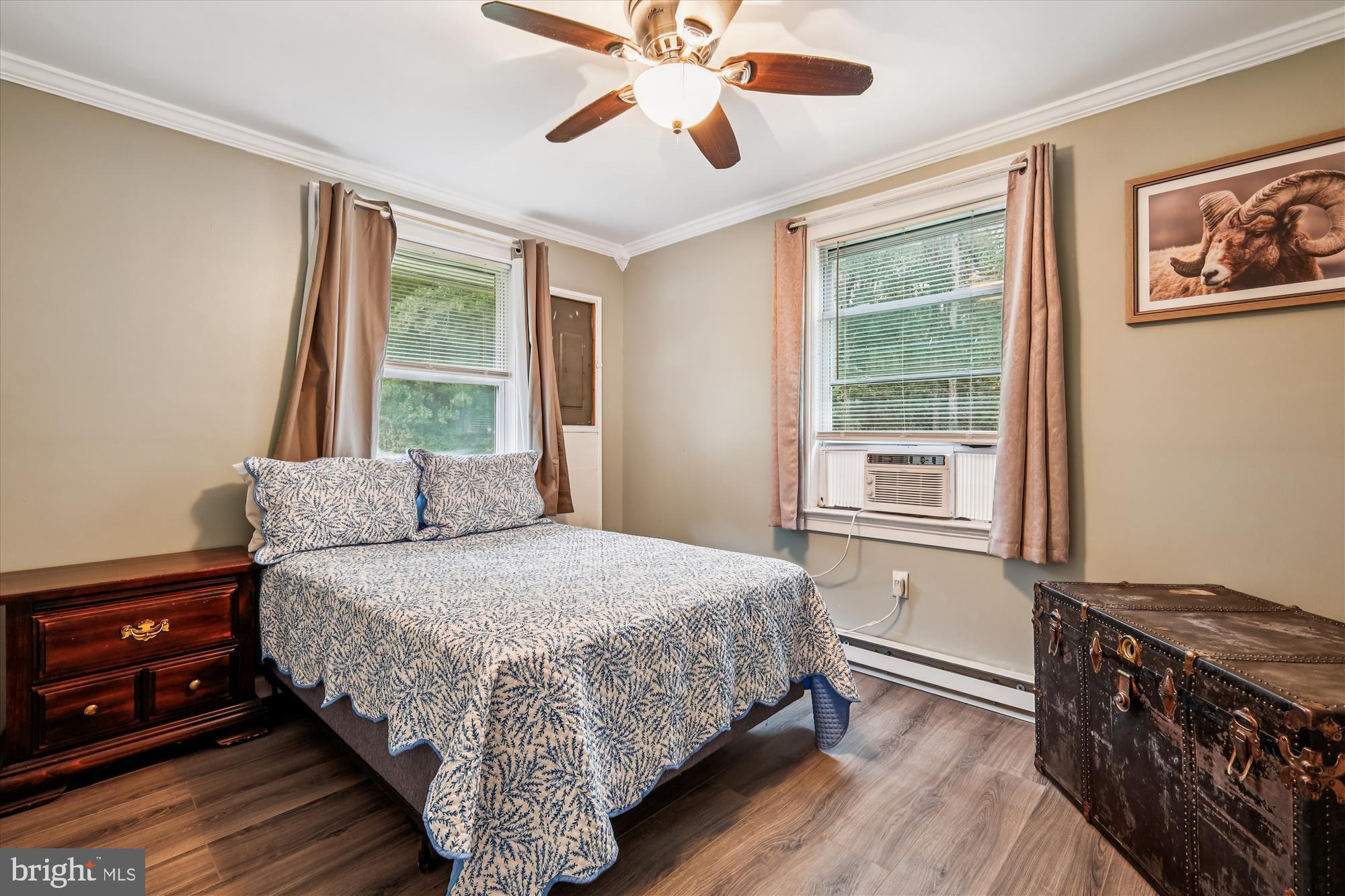 26623 Bee Tree Road Henderson, MD 21640 - Photo 16 of 33 a bedroom with a bed and a window