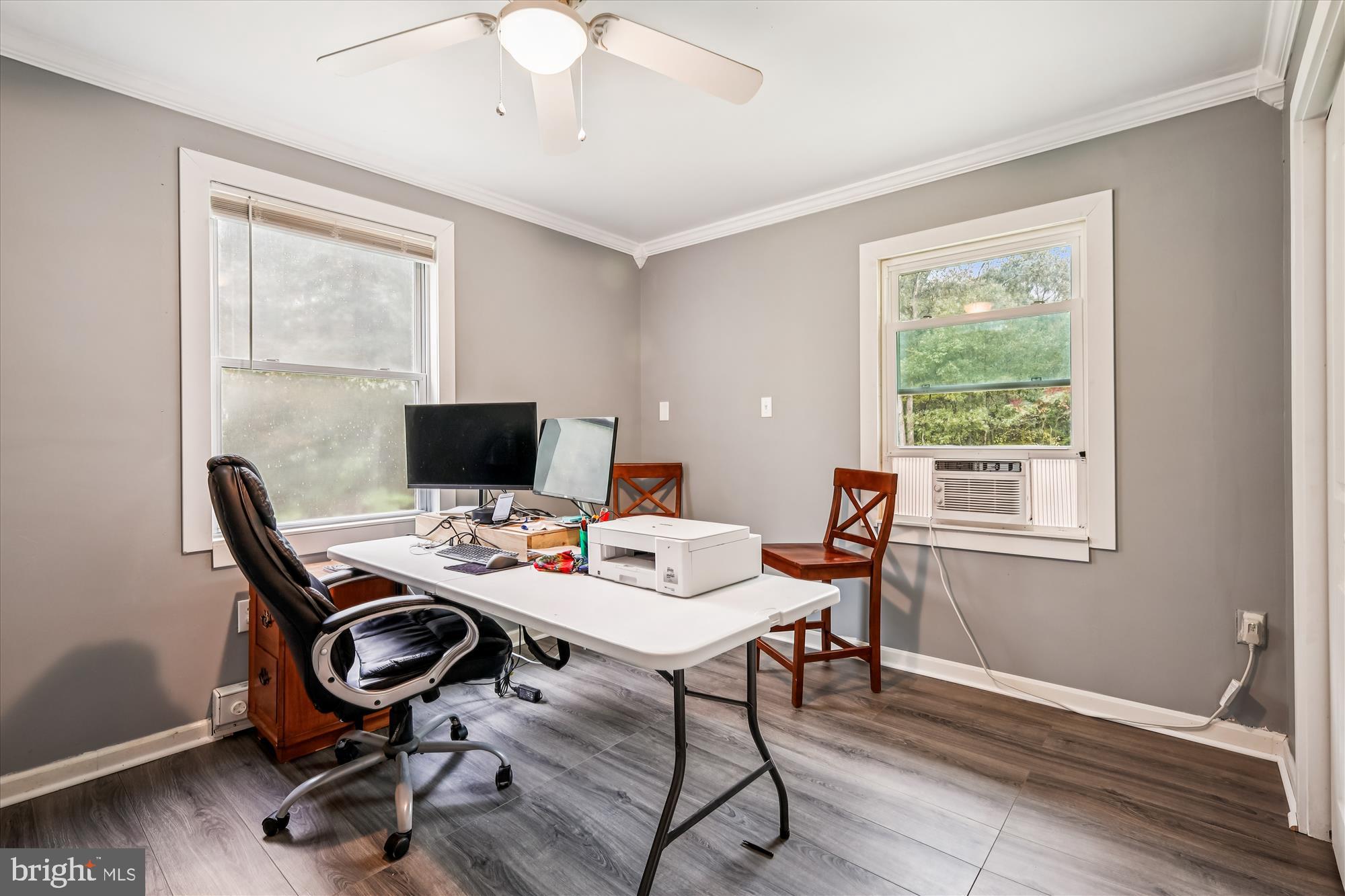 26623 Bee Tree Road Henderson, MD 21640 - Photo 19 of 33 a view of a workspace with furniture and a window