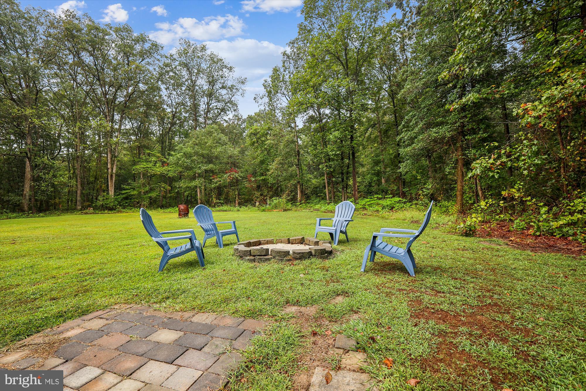 26623 Bee Tree Road Henderson, MD 21640 - Photo 24 of 33 a view of a bench in a garden