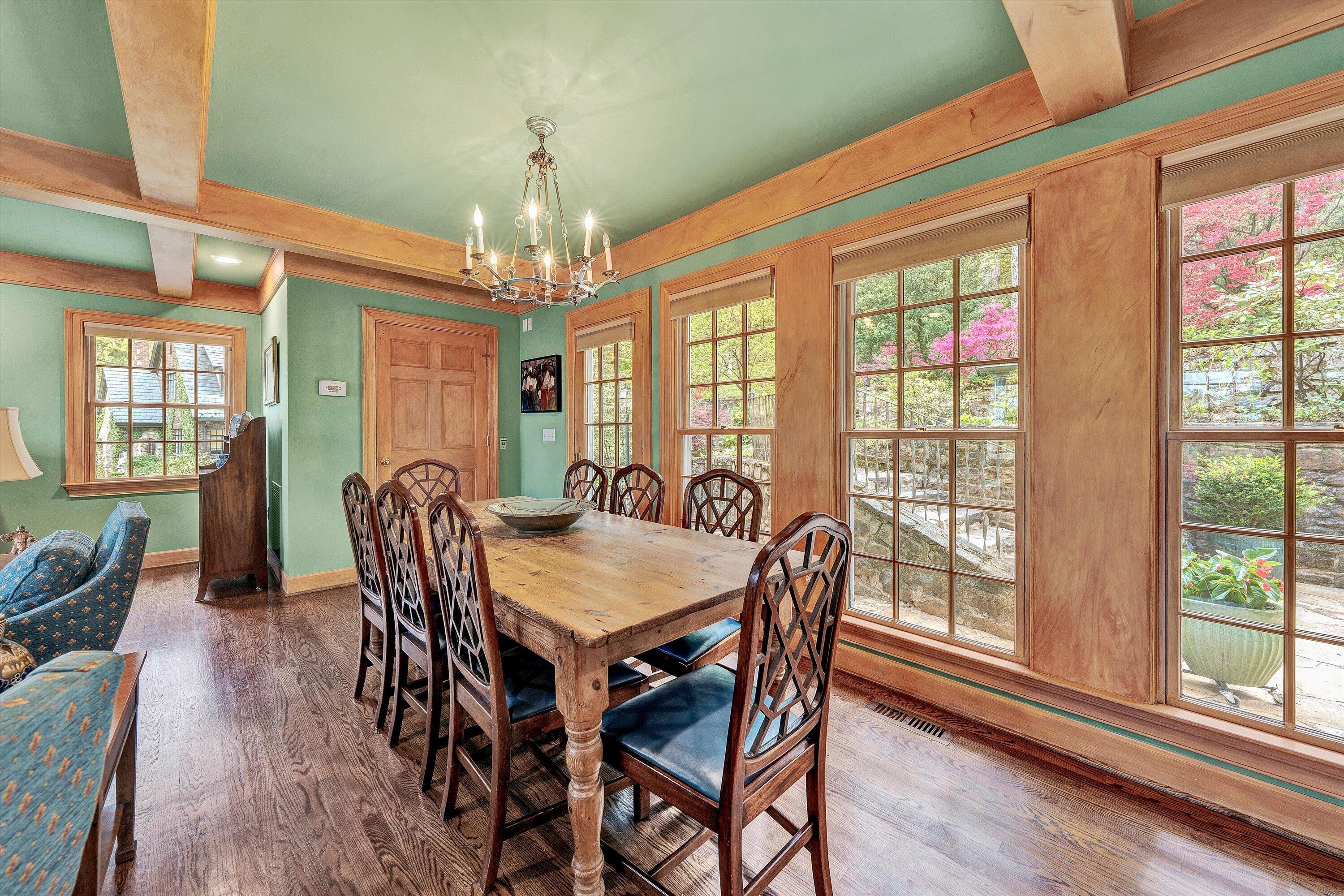 2438 Robin Hood Road Southeast Roanoke, VA 24014 - Photo 23 of 81 a view of a dining room with furniture window and wooden floor