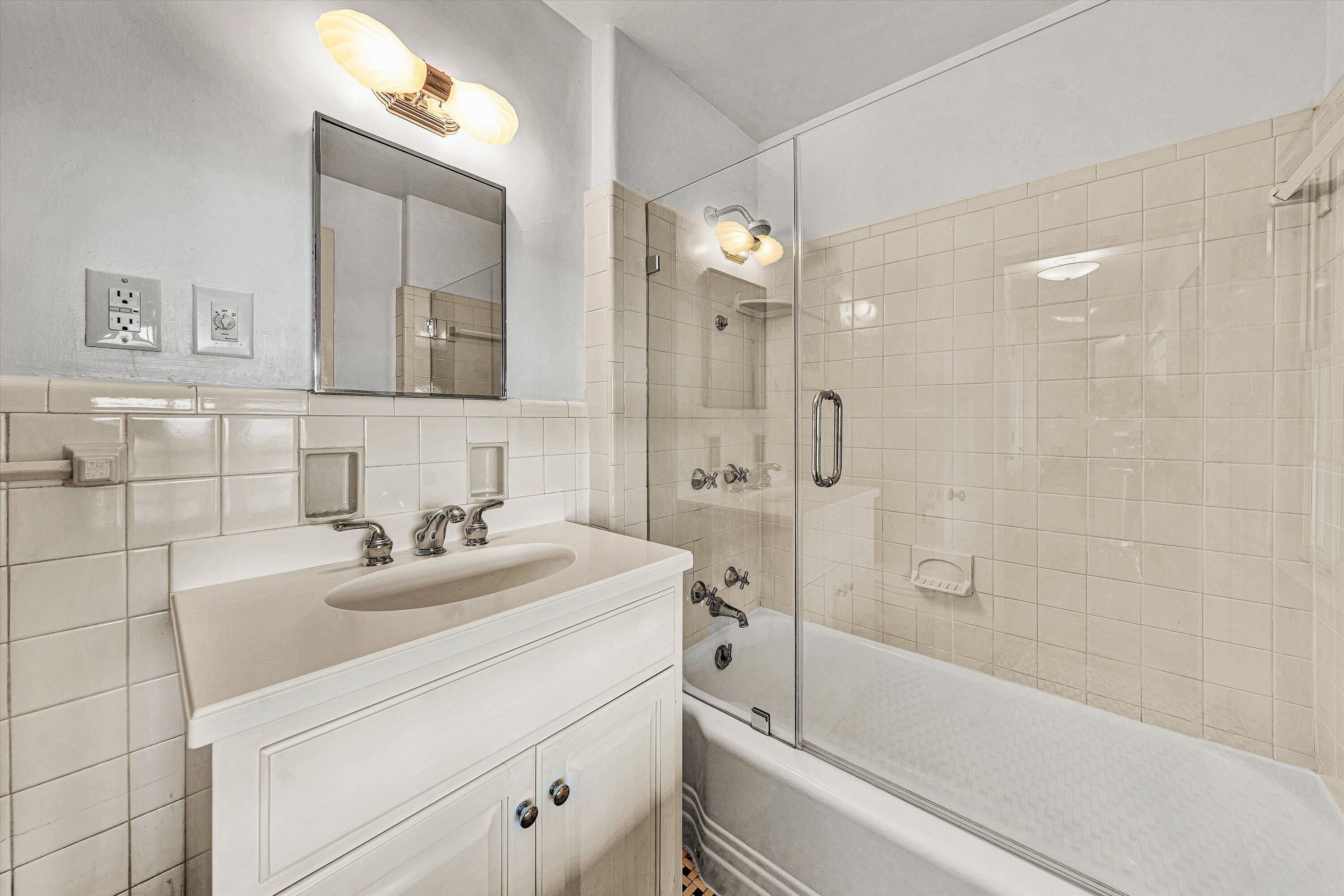 2438 Robin Hood Road Southeast Roanoke, VA 24014 - Photo 36 of 81 a bathroom with a sink a toilet and shower