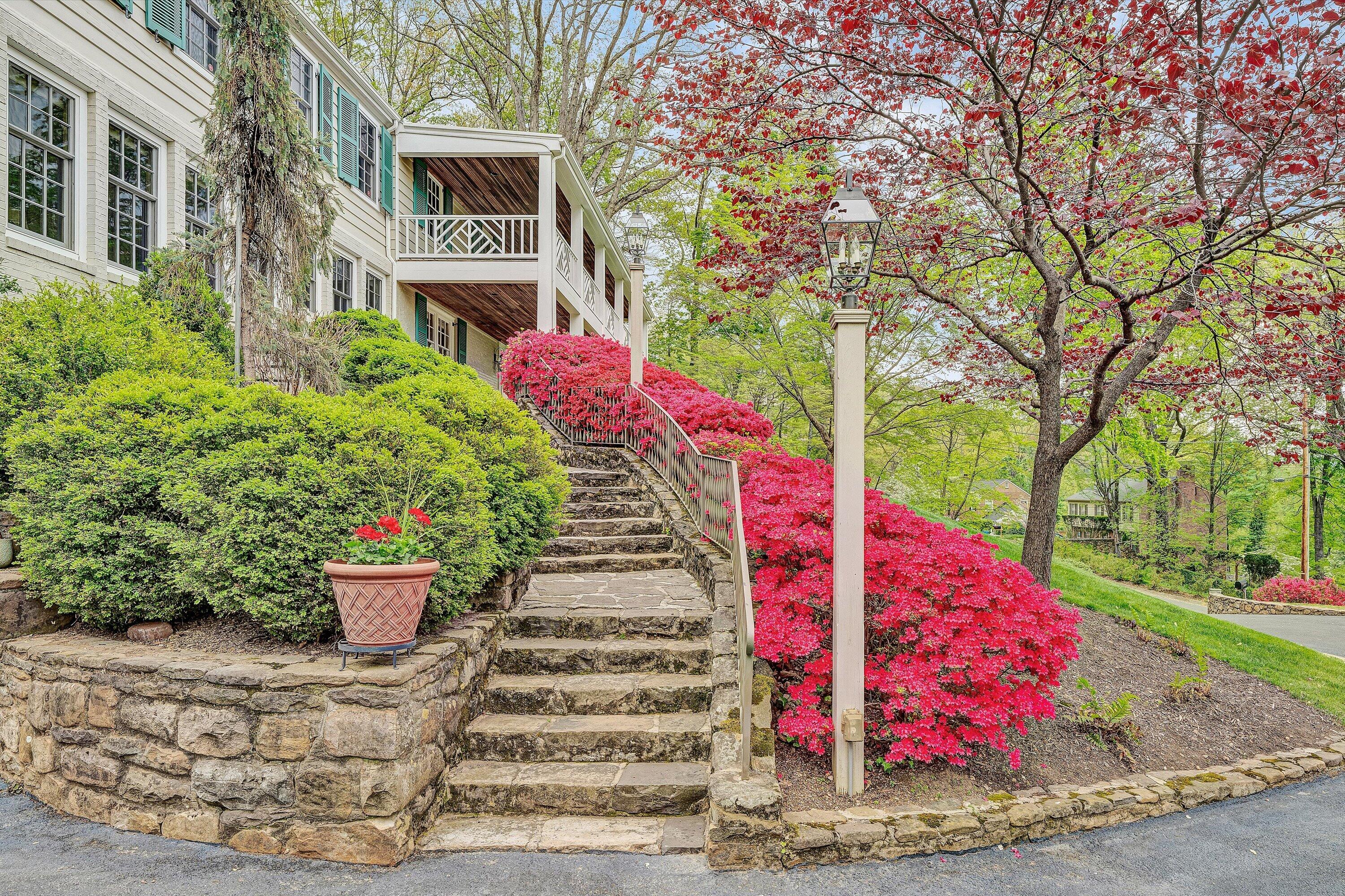2438 Robin Hood Road Southeast Roanoke, VA 24014 - Photo 5 of 81 a front view of a house with a yard