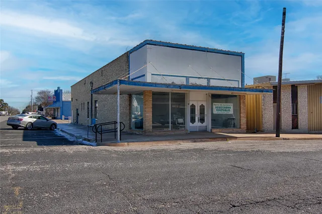 a front view of a house with a porch