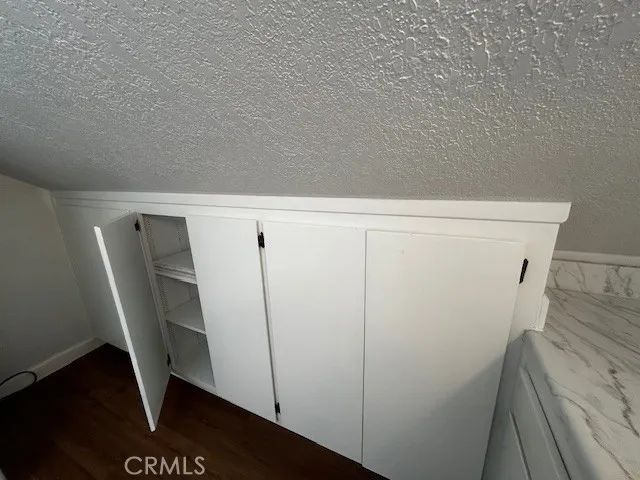 a view of outdoor space with wooden floor