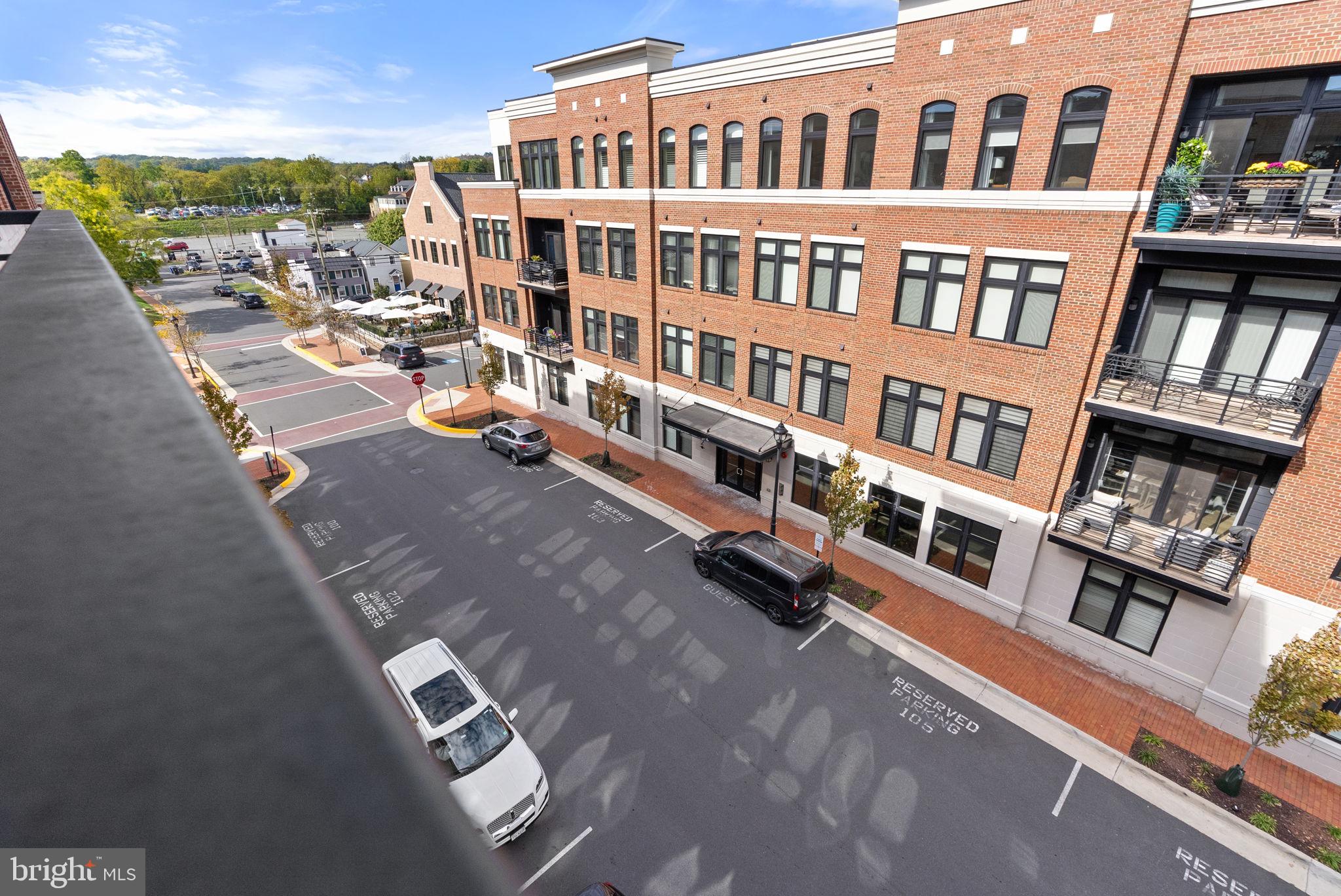 3 Stationmaster Street Southeast, Unit 402 Leesburg, VA 20175 - Photo 31 of 46 a view of city with tall buildings