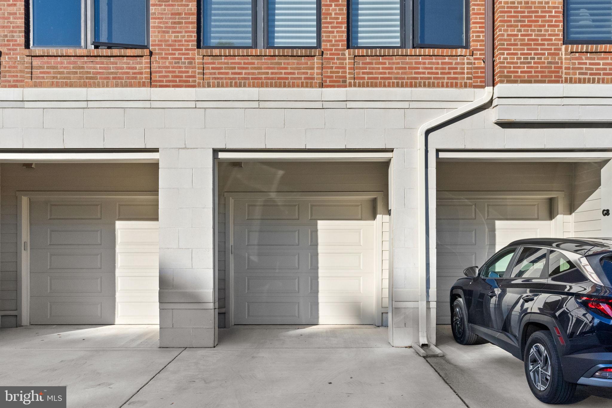3 Stationmaster Street Southeast, Unit 402 Leesburg, VA 20175 - Photo 33 of 46 a car parked in front of a house