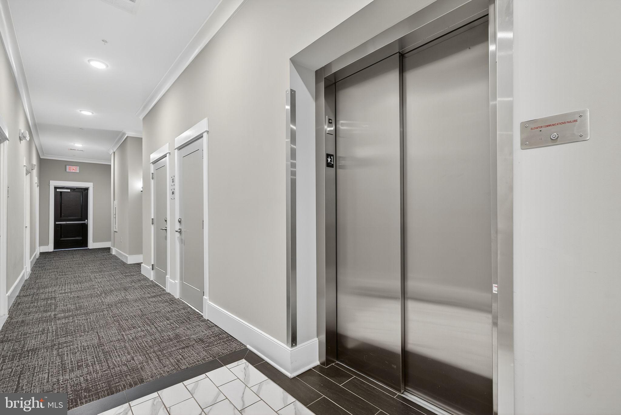 3 Stationmaster Street Southeast, Unit 402 Leesburg, VA 20175 - Photo 37 of 46 a view of a hallway