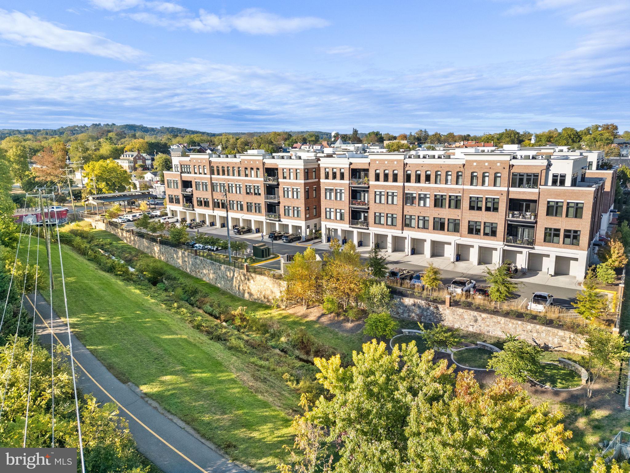3 Stationmaster Street Southeast, Unit 402 Leesburg, VA 20175 - Photo 39 of 46 a view of a city with tall buildings