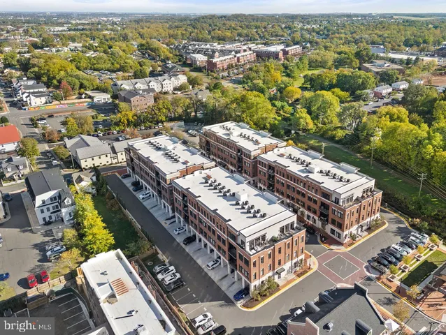 an aerial view of a city with lots of residential buildings