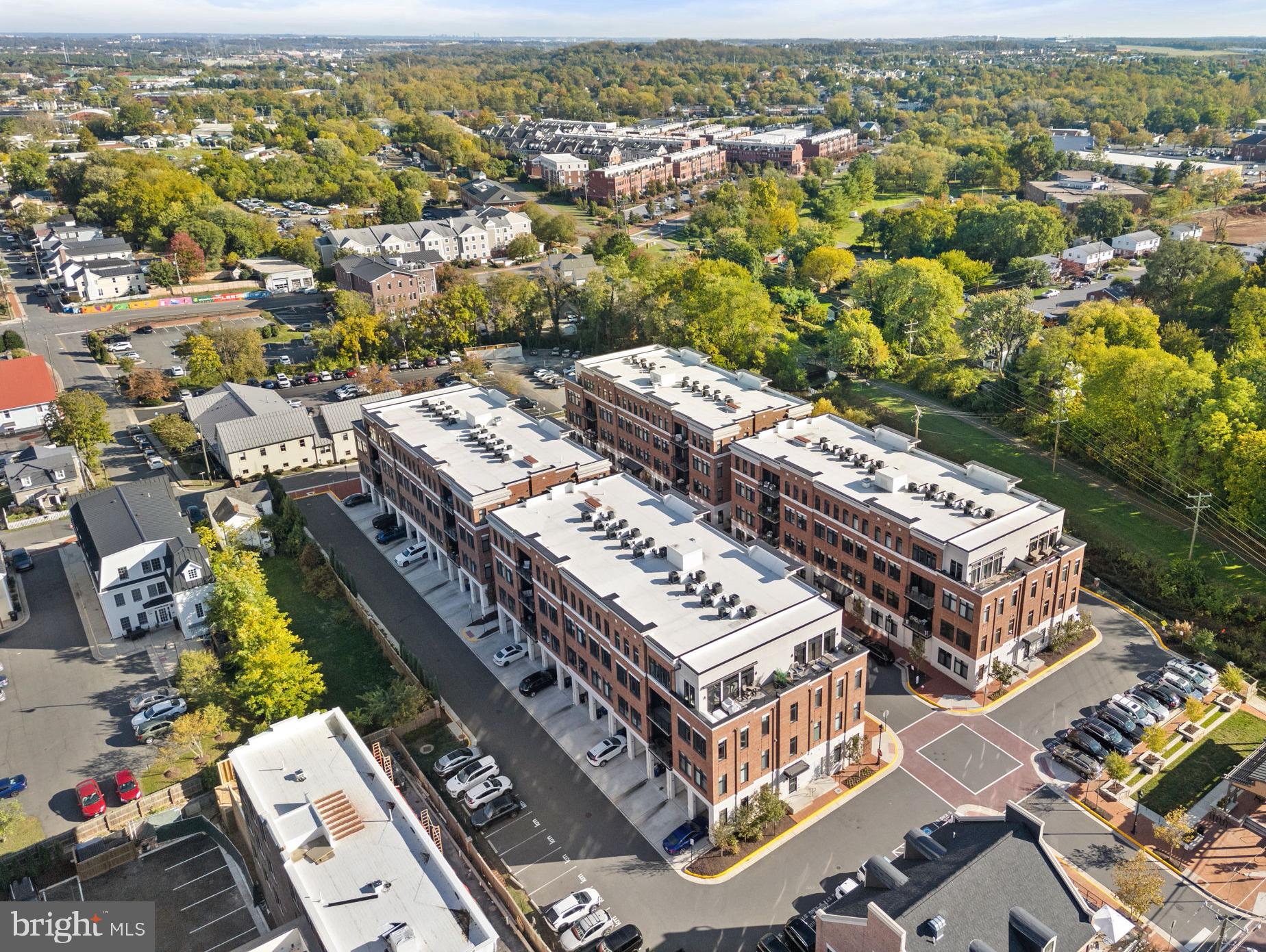 3 Stationmaster Street Southeast, Unit 402 Leesburg, VA 20175 - Photo 41 of 46 an aerial view of a city with lots of residential buildings