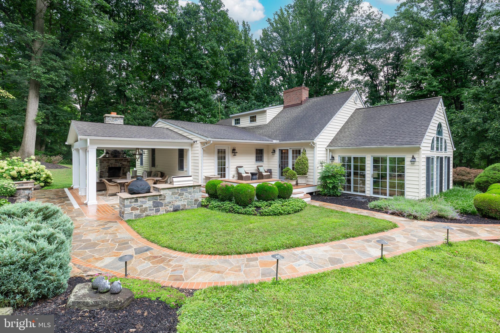3703 Wine Road Westminster, MD 21158 - Photo 8 of 96 Covered patio with a gorgeous stone fireplace
