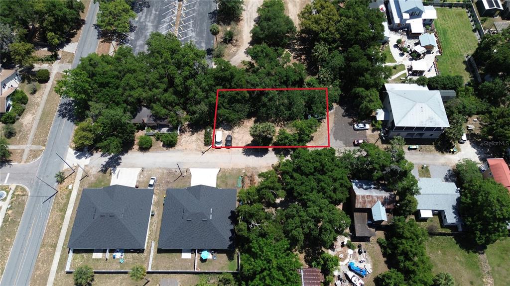 Dewitt Court Eustis, FL 32726 - Photo 4 of 8 an aerial view of house with yard