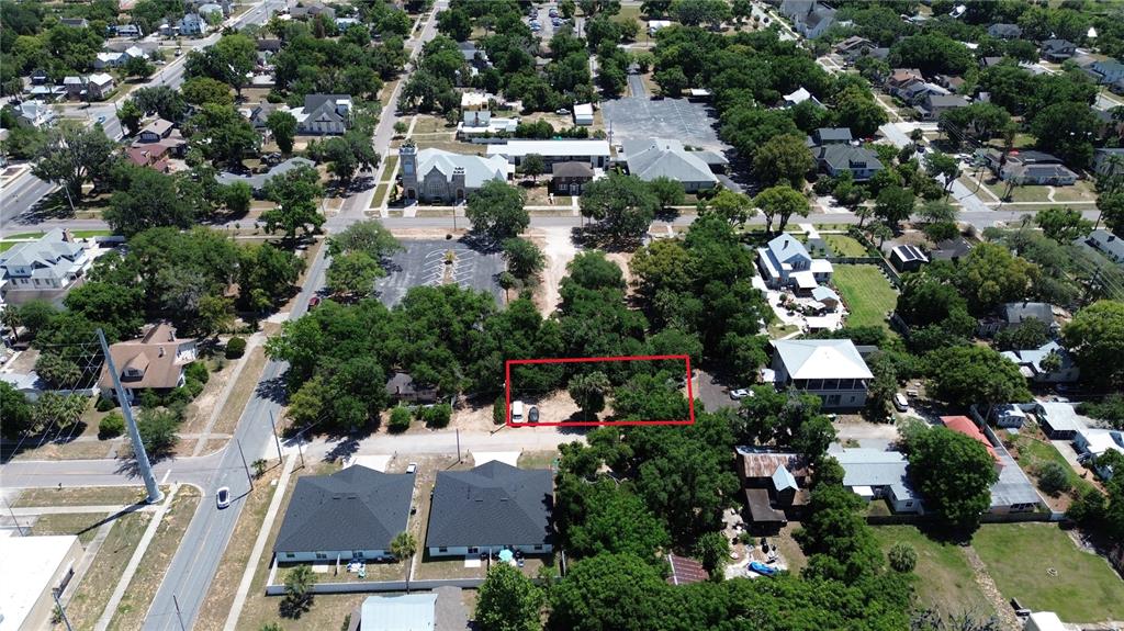 Dewitt Court Eustis, FL 32726 - Photo 5 of 8 an aerial view of multiple houses with yard