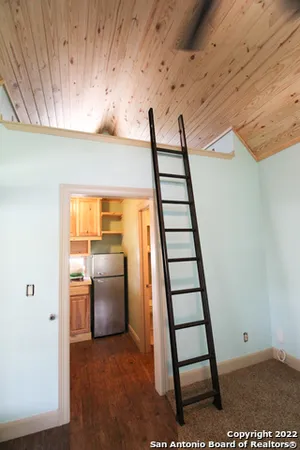 a view of entryway with a front door
